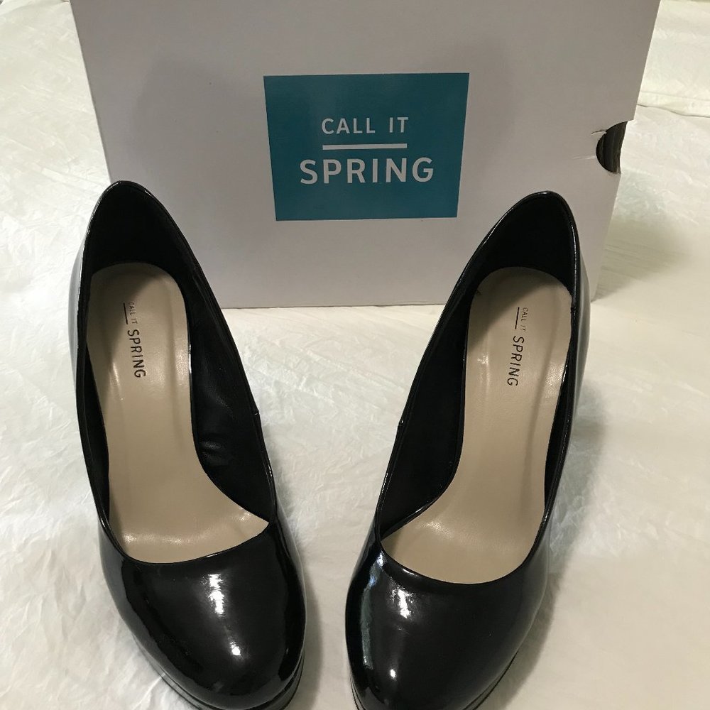 Black shoes, material like patent leather. Style Willodean. Size 8